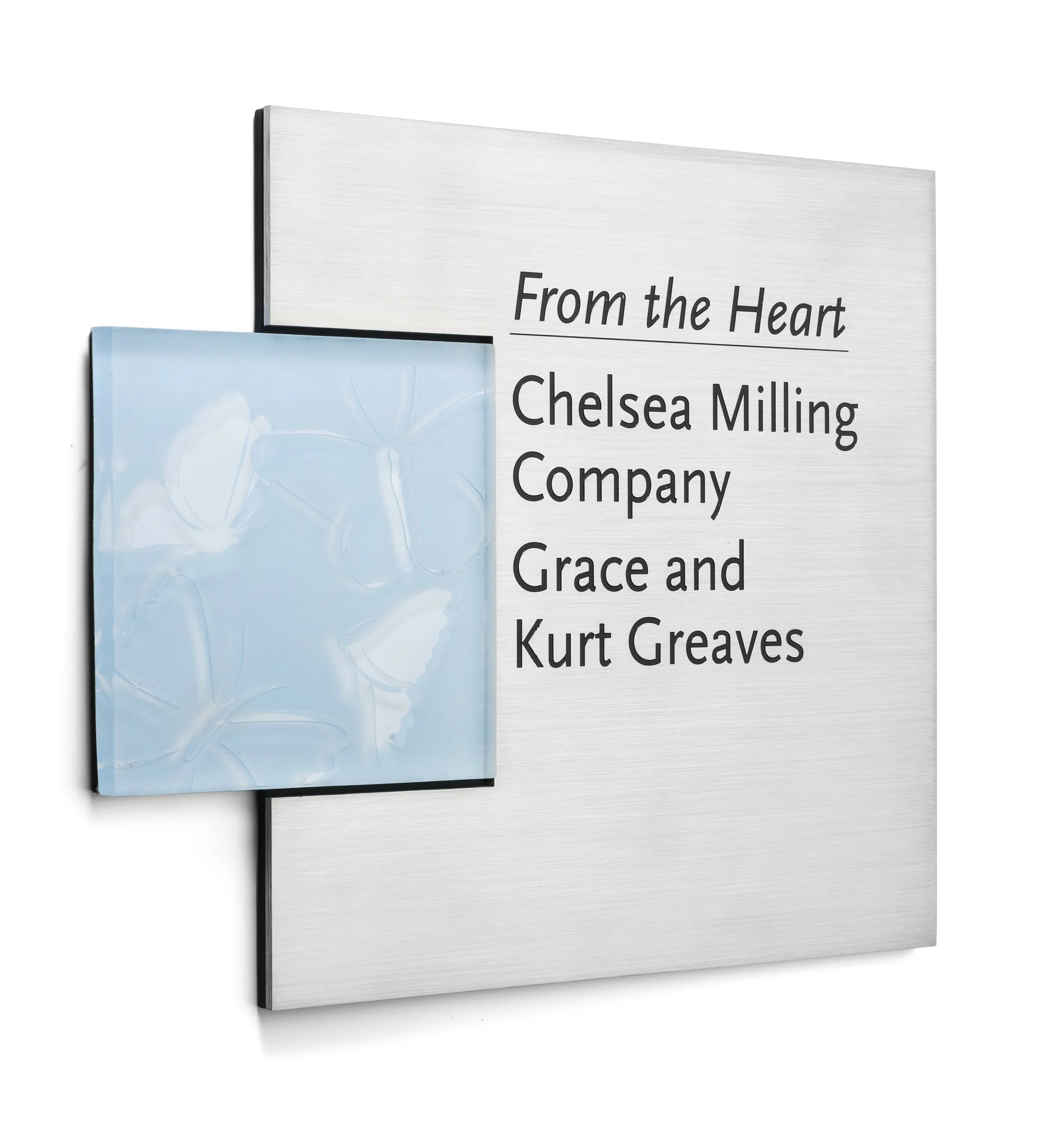 Wall art with text and a blue butterfly design, reading 'From the Heart, Chelsea Milling Company, Grace and Kurt Greaves'.