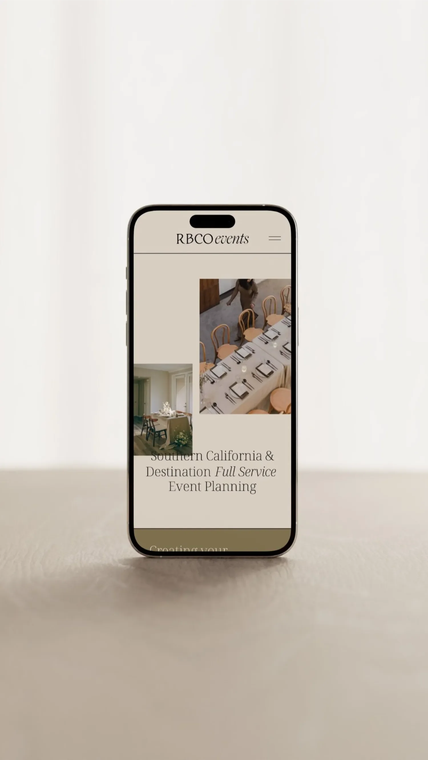 A smartphone displaying an event planning website, with images of decorated tables and text about Southern California event planning services.