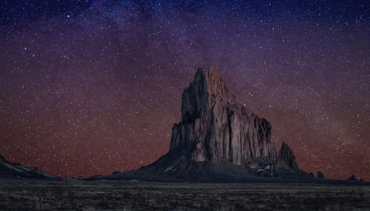 Steven J. Yazzie, Throwing Stars Over Monsters, 2025, archival print on aluminum, 28 x 48 in.