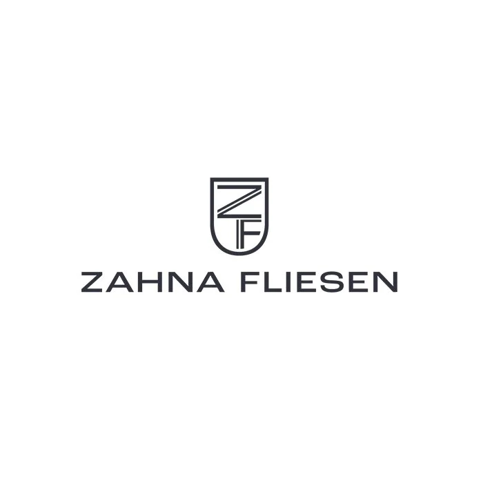 Firmenlogo mit dem Text "ZAHNA FLIESEN" und einem stilisierten Symbol über dem Namen.