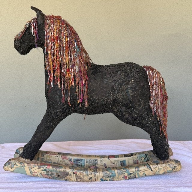 Beaded Horse
Paper mache foundation, beaded Horse. Mane & tail are threads from used Indian Sari's
25 1/2" x 25 1/4" - 2007
$800