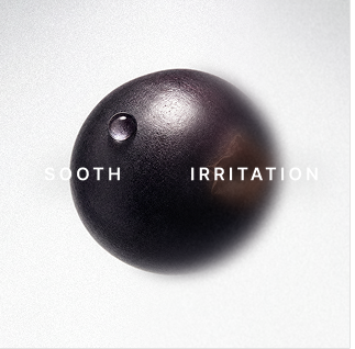 A black sphere with a small water droplet on its surface, labeled with the words "SOOTH" and "IRRITATION" to represent calming relief from irritation.