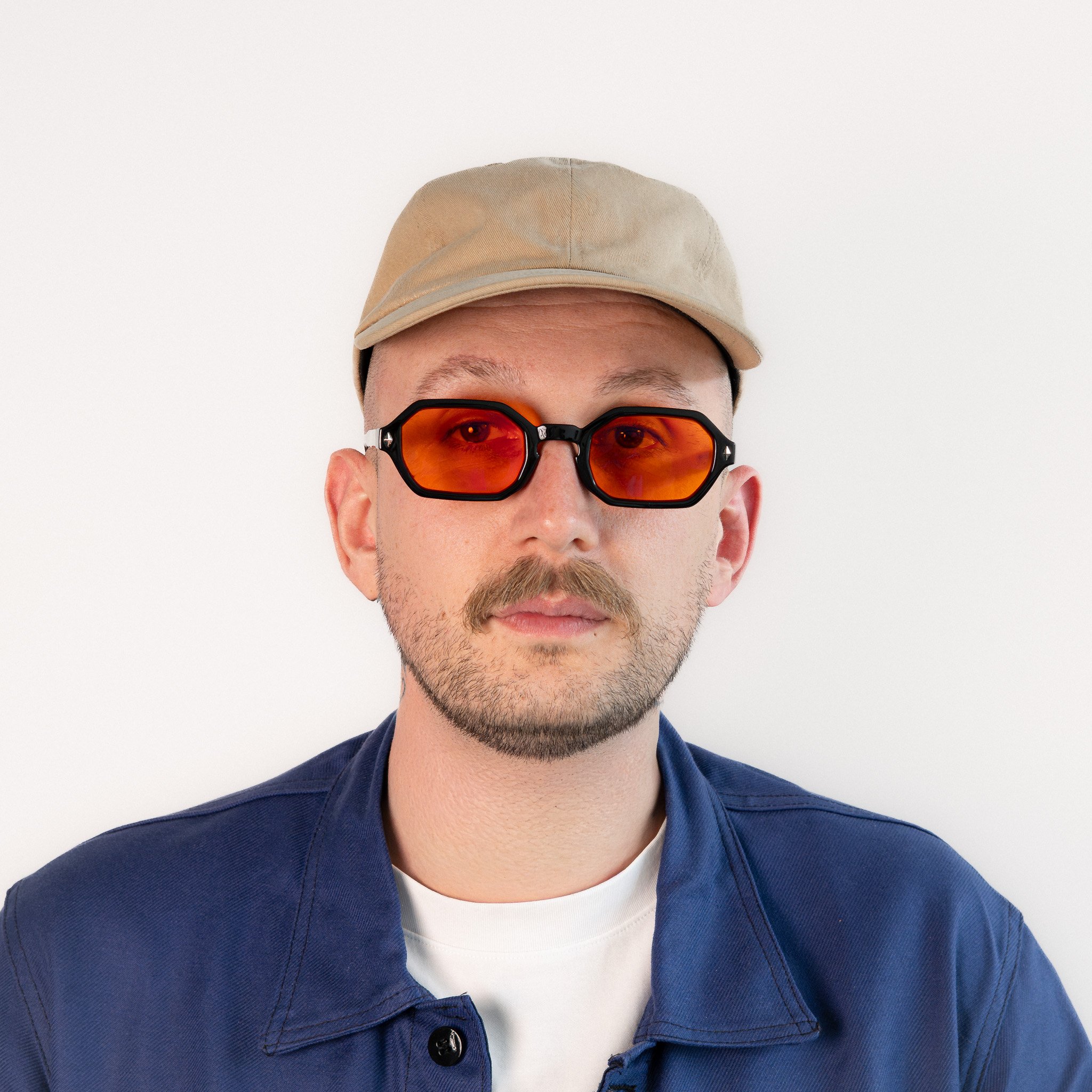 Soho blue light glasses worn front view black hexagonal frame with amber orange lenses