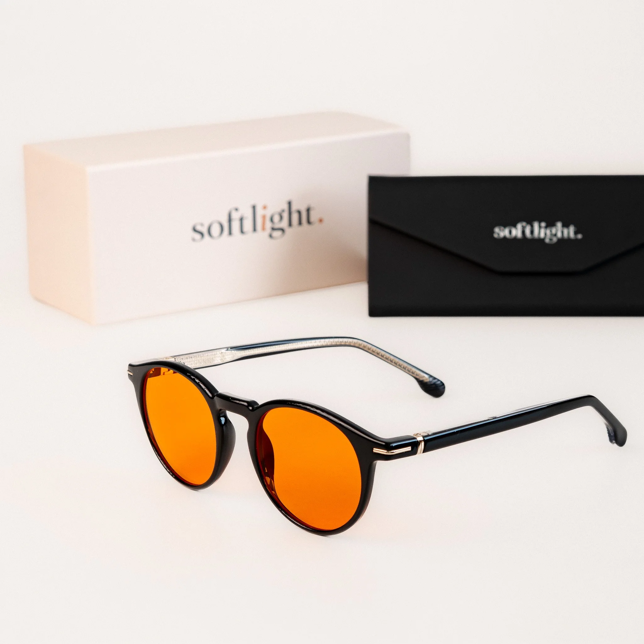 Durham blue light glasses front view black acetate round frame with amber orange lenses with packaging