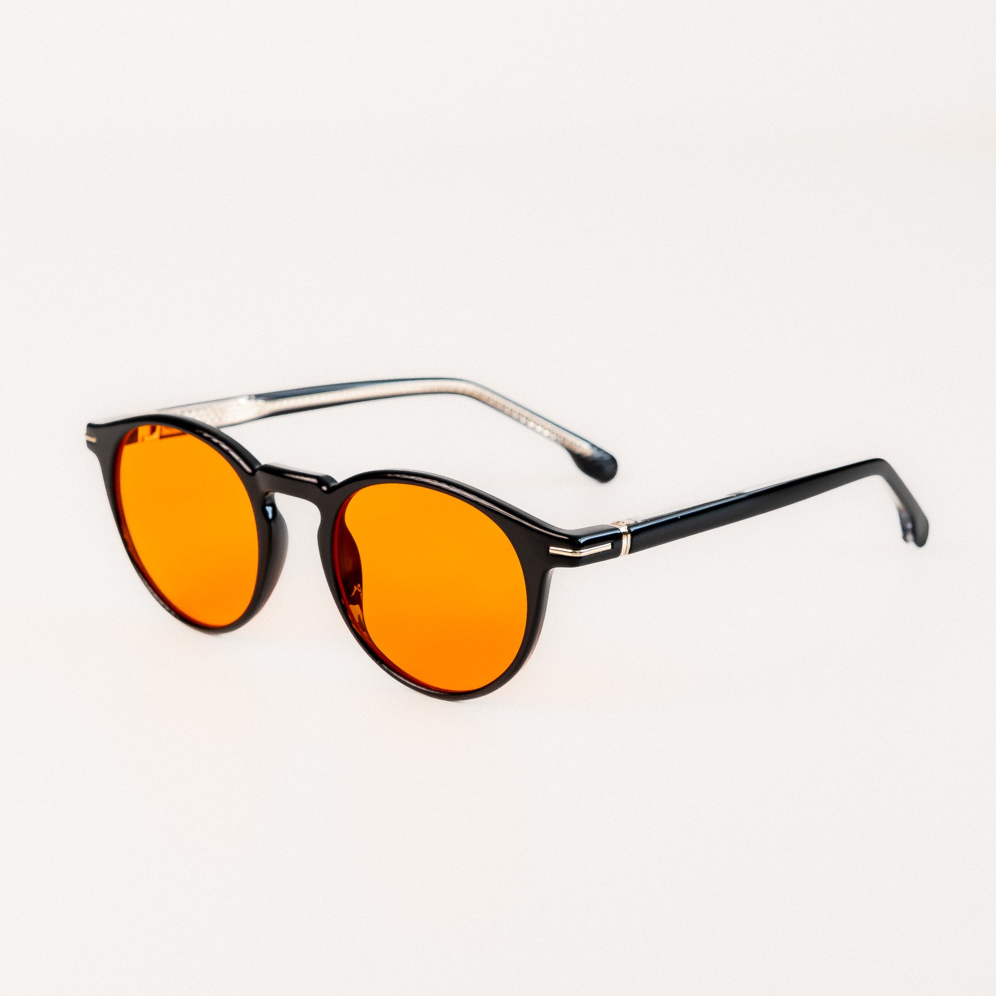 Durham blue light glasses side view black acetate round frame with amber orange lenses