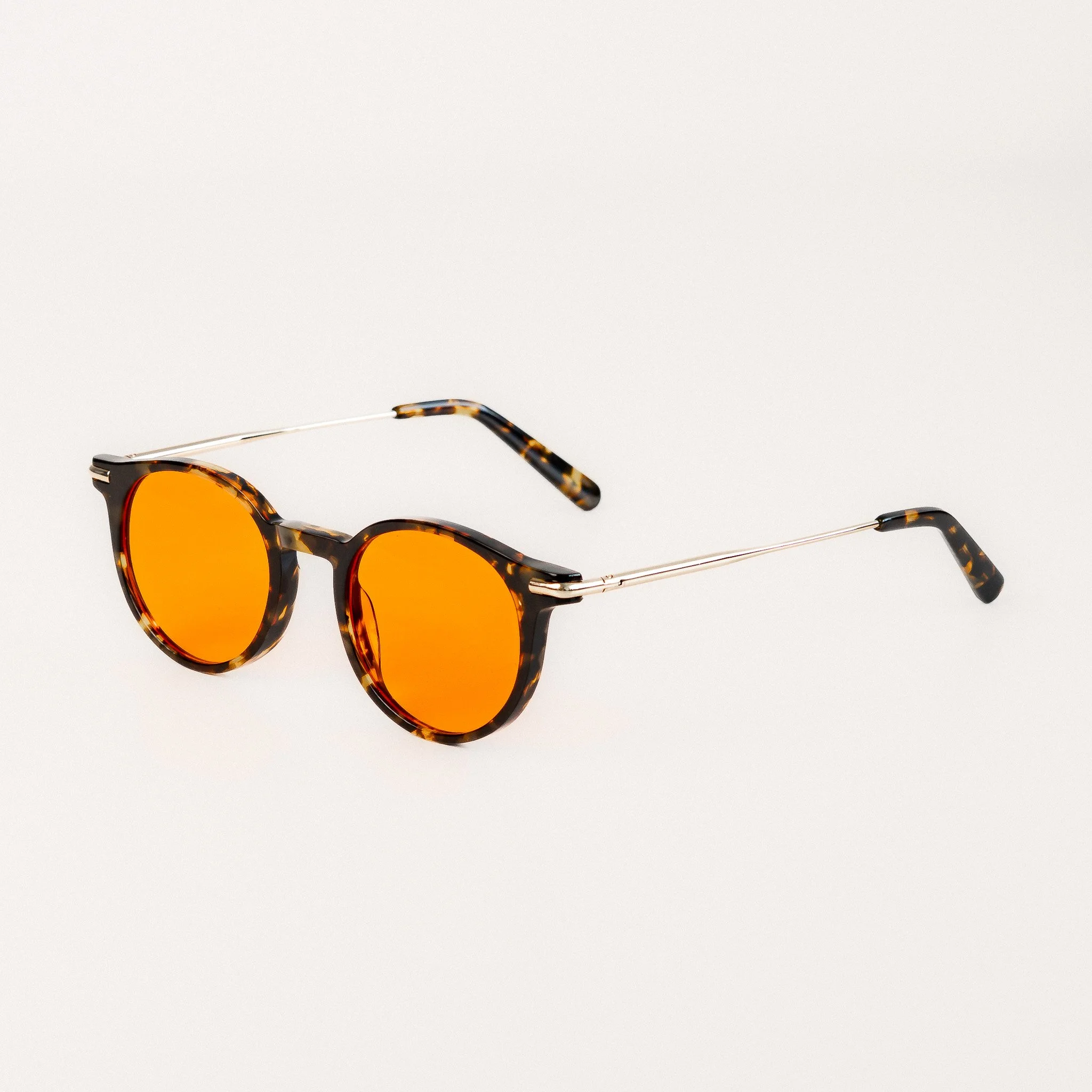 Alden blue light glasses side view tortoise acetate round frame with amber orange lenses