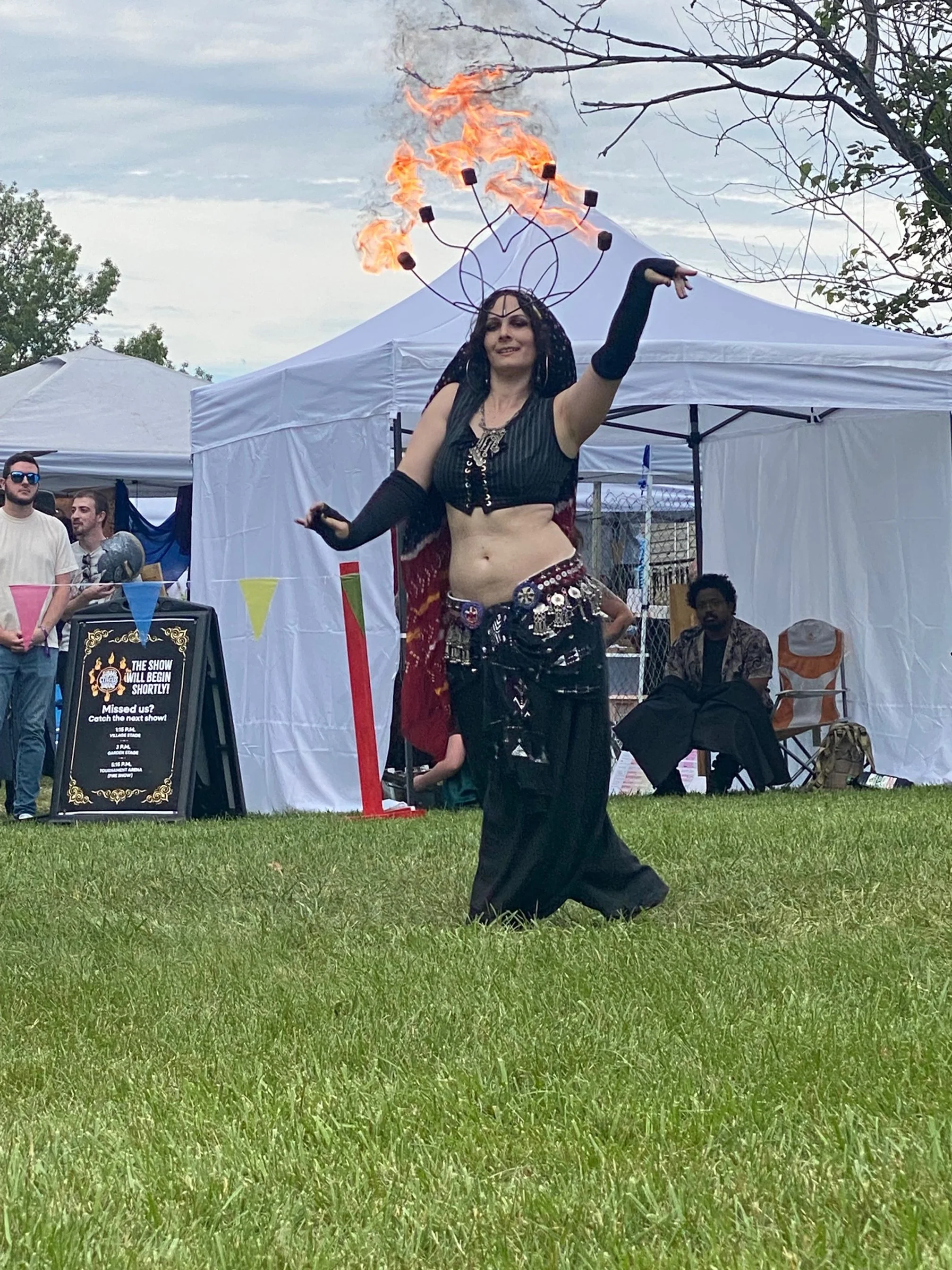 Geometric drawing of an outline square with sections divided by vertical, horizontal, and circle lines.