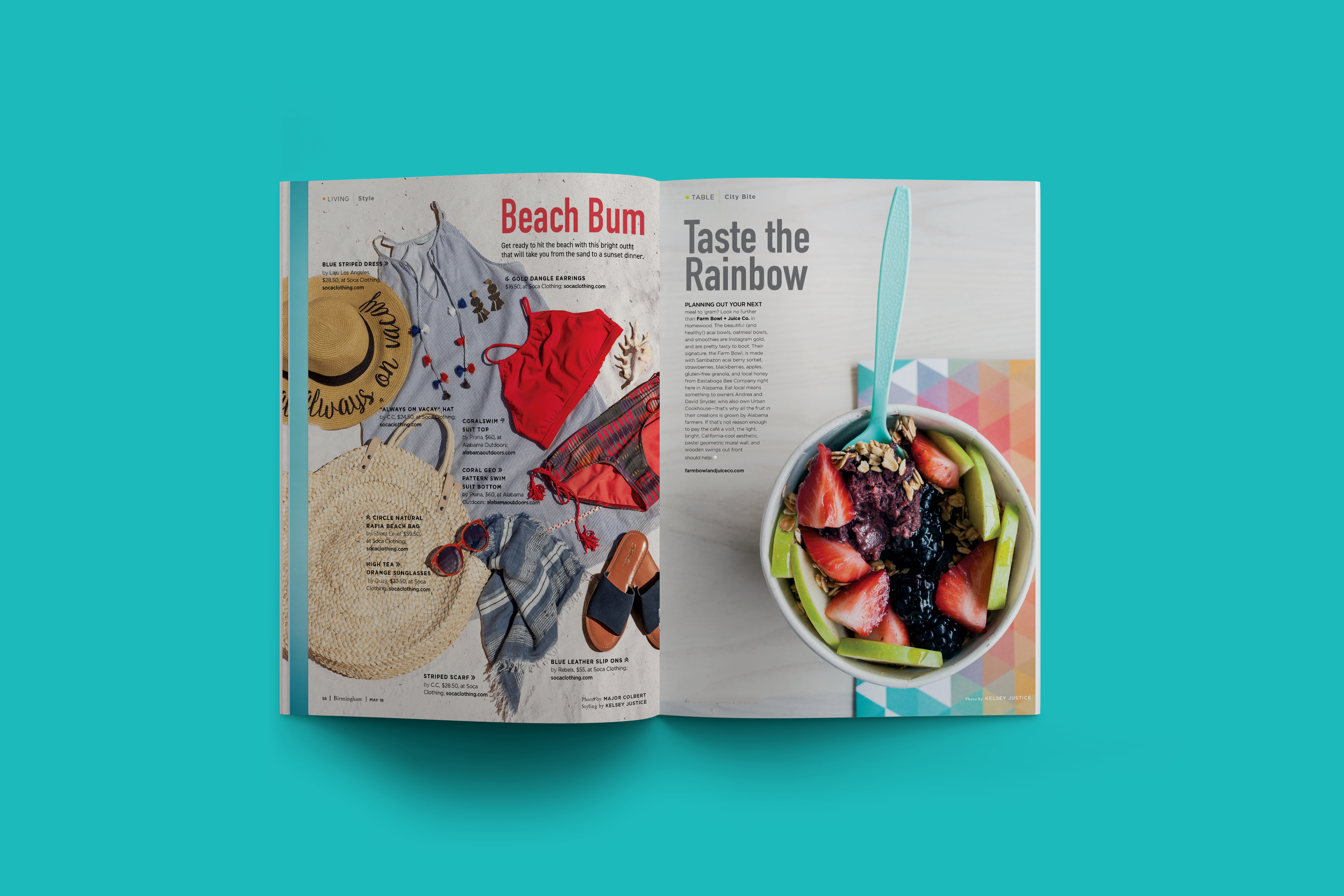 An open magazine on a turquoise surface showing a beach-themed fashion spread on the left page and a healthy fruit bowl with a blue spoon on the right page.