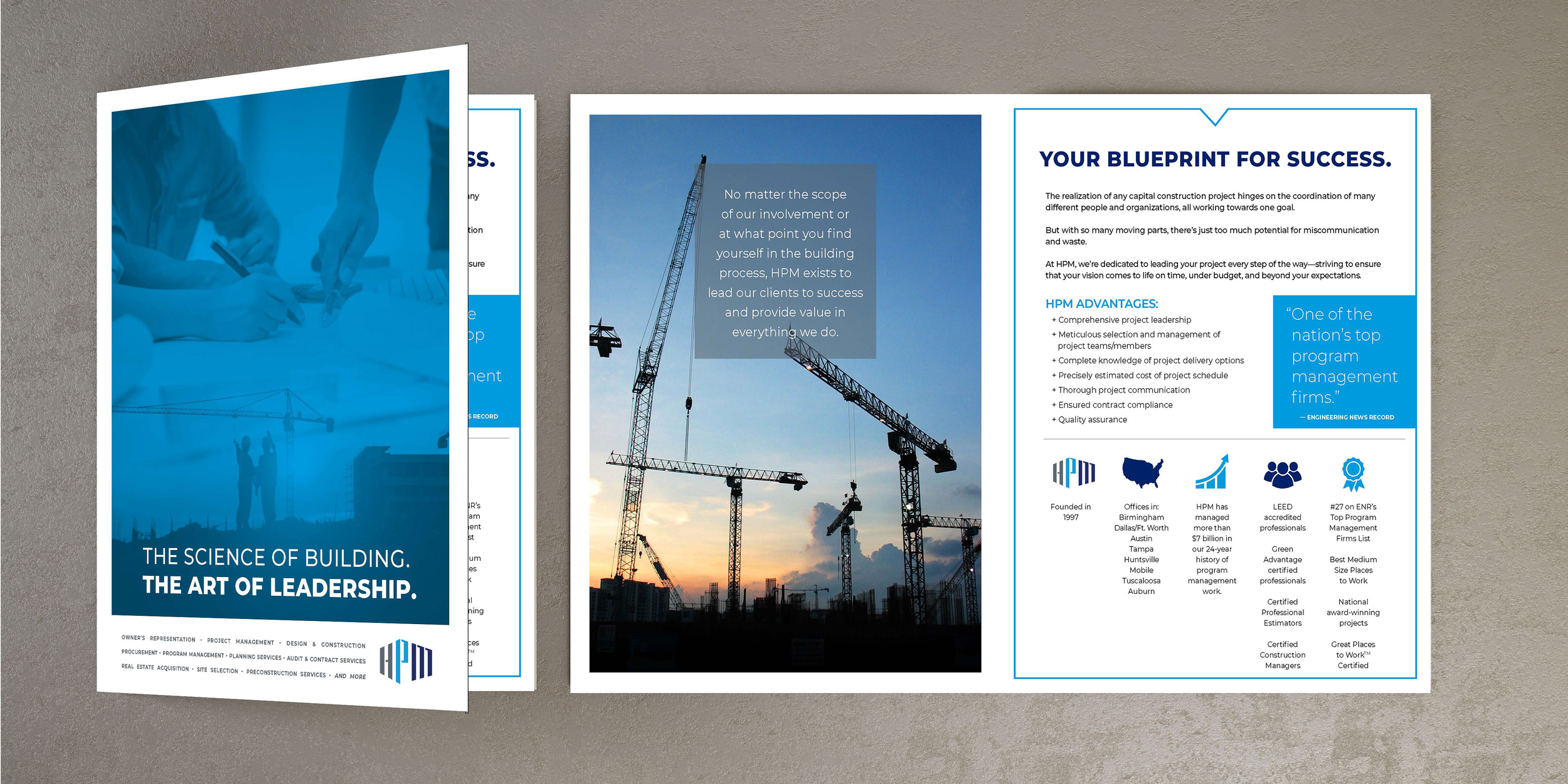 Three construction brochures with images of cranes and construction sites, and text describing construction project management services and leadership.