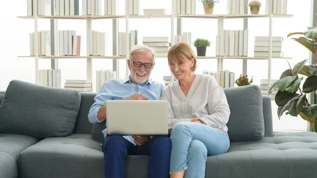 older couple doing online couples therapy Asheville NC