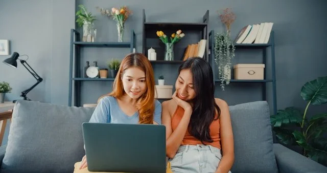 same-sex couple doing online LGBTQ couples counseling Boston