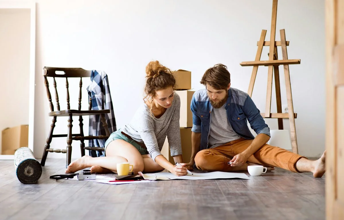 young couple moving into their new house