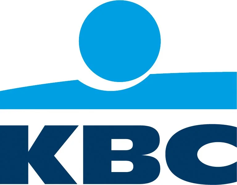 Logo of KBCT with a blue circle and curved lines above the white and blue letters 'KBCT'.