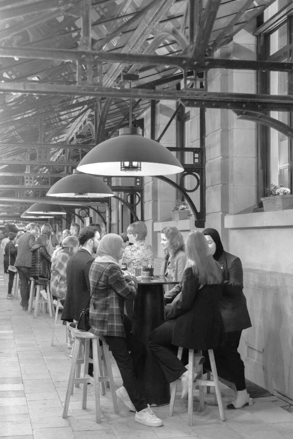 Women in tech standing at high tables for networking at a clusity event