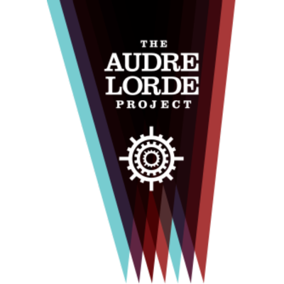 Logo for The Audre Lorde Project with a gear symbol and text on a geometric background.