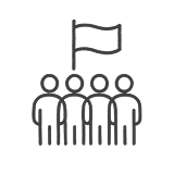 Four people standing in a line holding a flag.