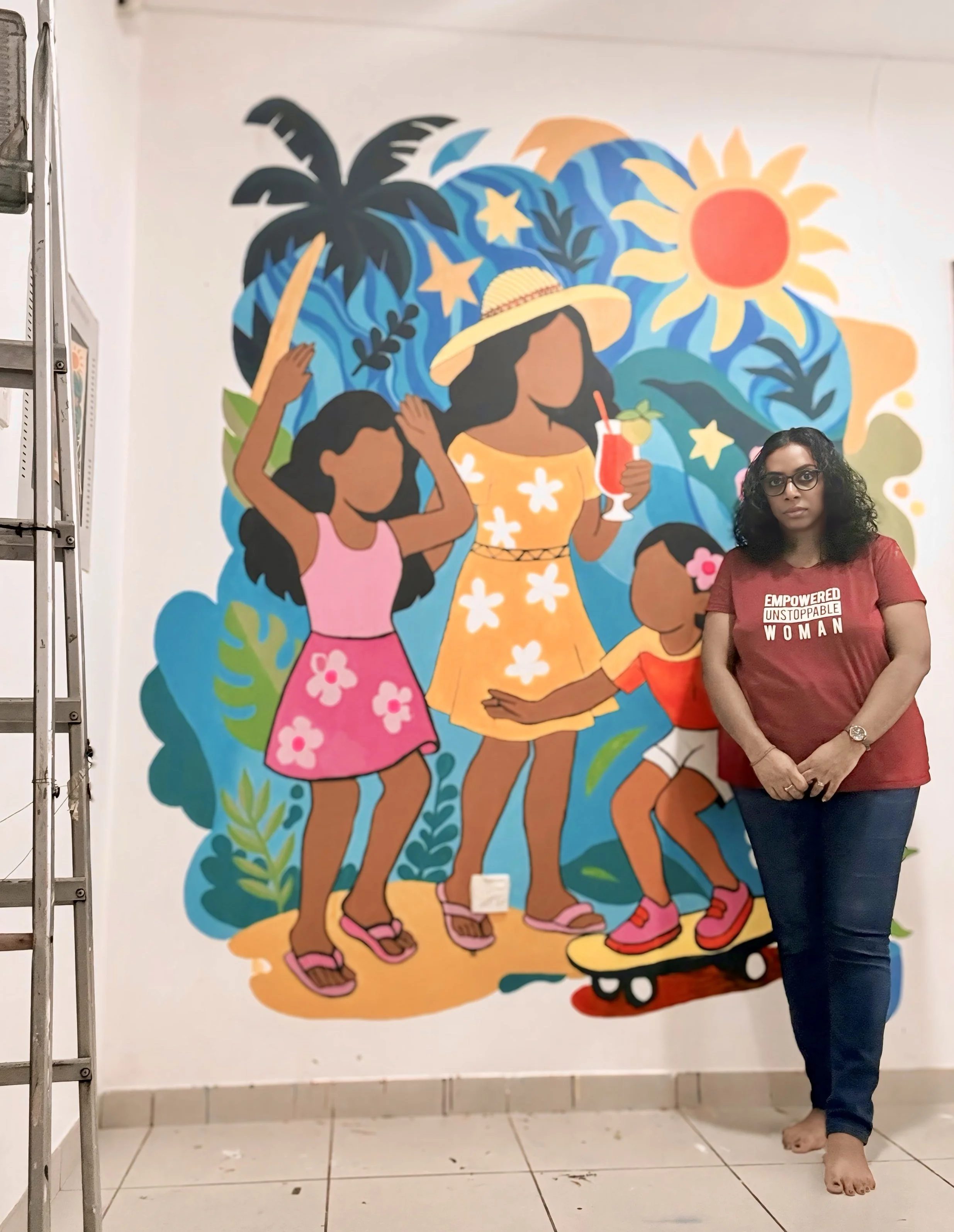 Sunlit Sisterhood (Mural)
Acrylic mural of three women in a lush tropical landscape of palms, waves, and sun, celebrating joy, movement, and everyday strength. Painted on-site as a large wall commission.