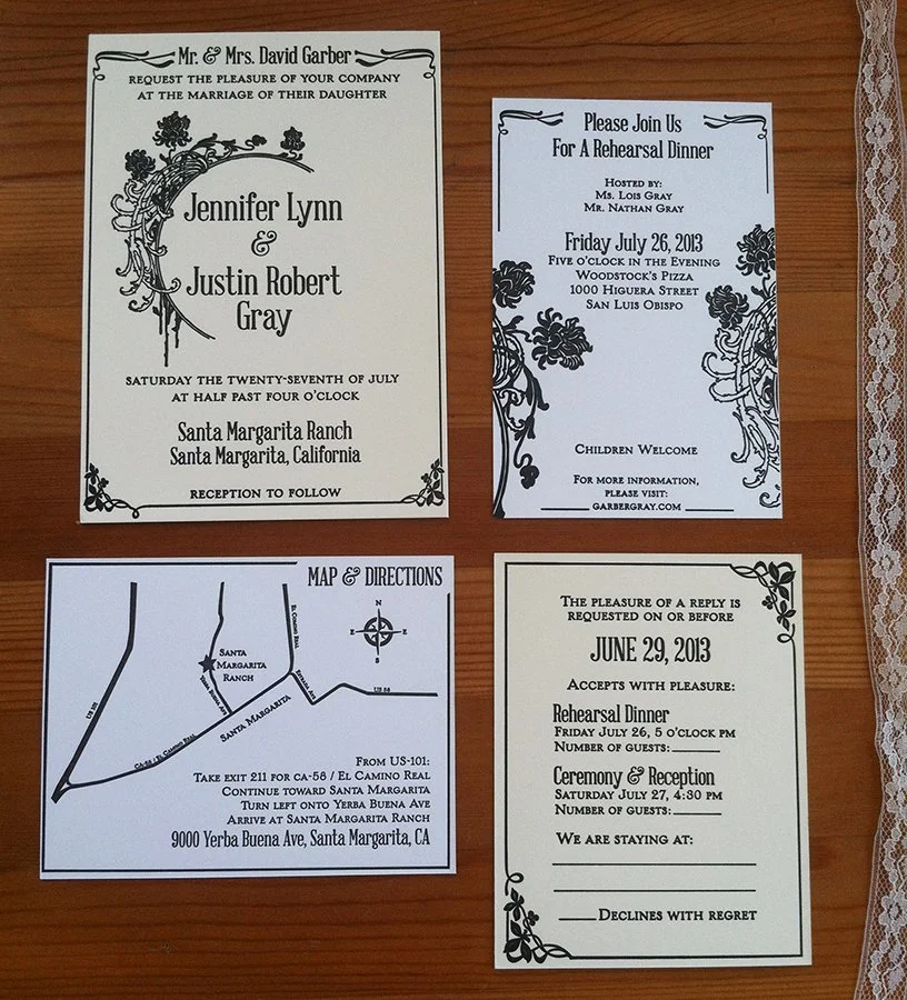 Wedding invitations custom designed for letterpress and hand printed, including a rehearsal dinner, map, and RSVP card, laid out on a wooden surface.