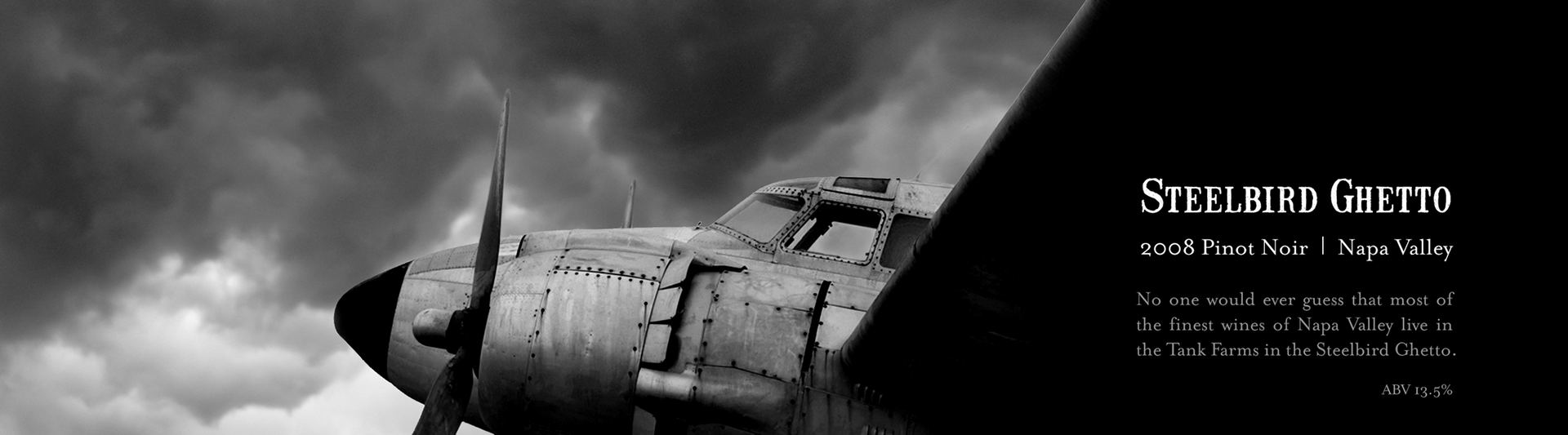 Wine label design. Black and white photo of a vintage propeller airplane with text overlay on right side mentioning 'Steelbird Ghetto', vintage wine from Napa Valley, and details about the wine and vineyard.