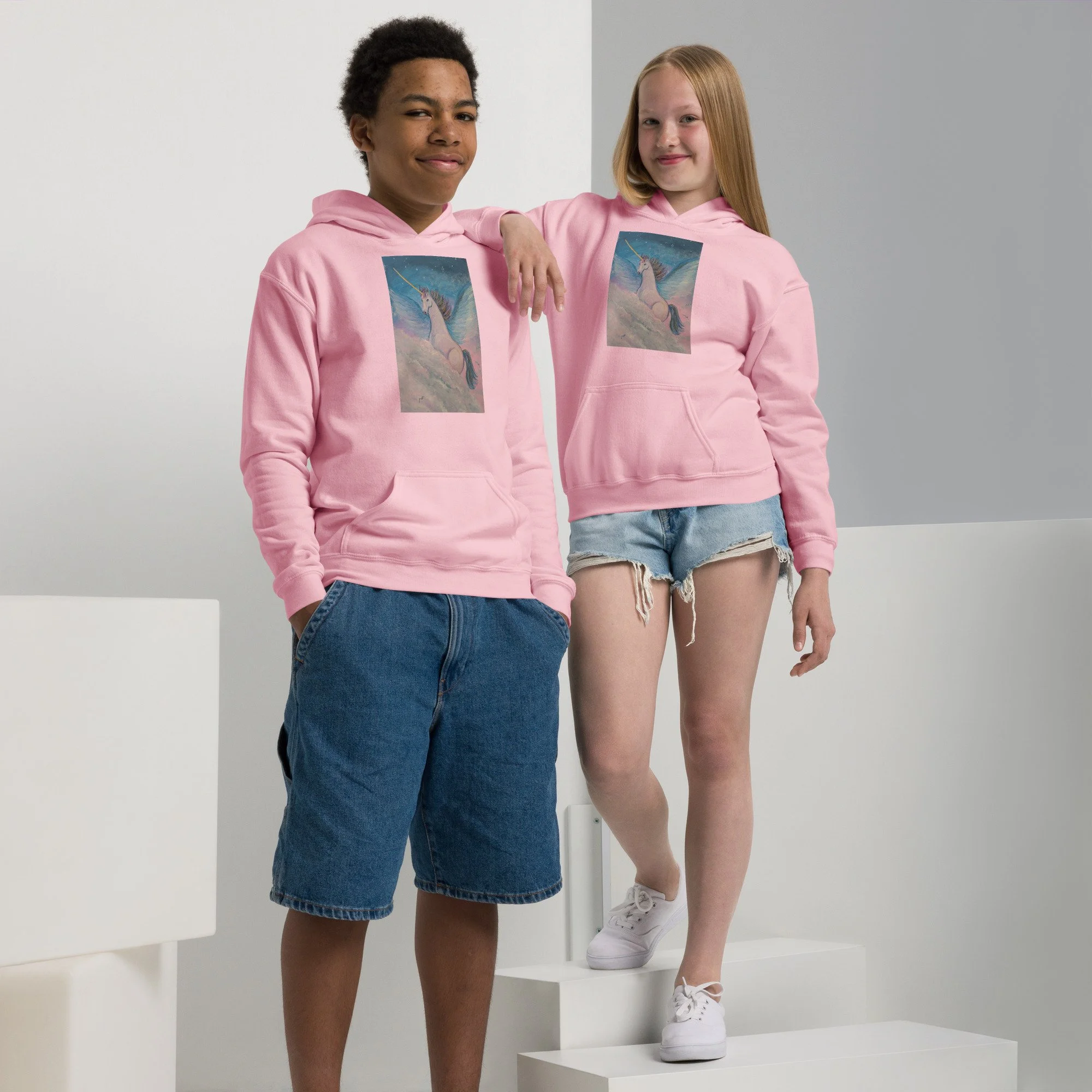 youth-heavy-blend-hoodie-light-pink-front-6ac1b6a7509a2.jpg