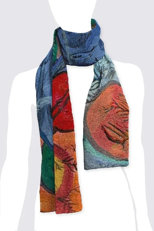 Colorful scarf with abstract face design on a mannequin.