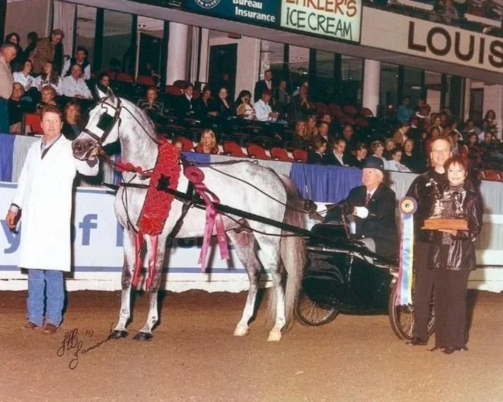 Neil Chur and Hey Hallelujah's victory shot with roses