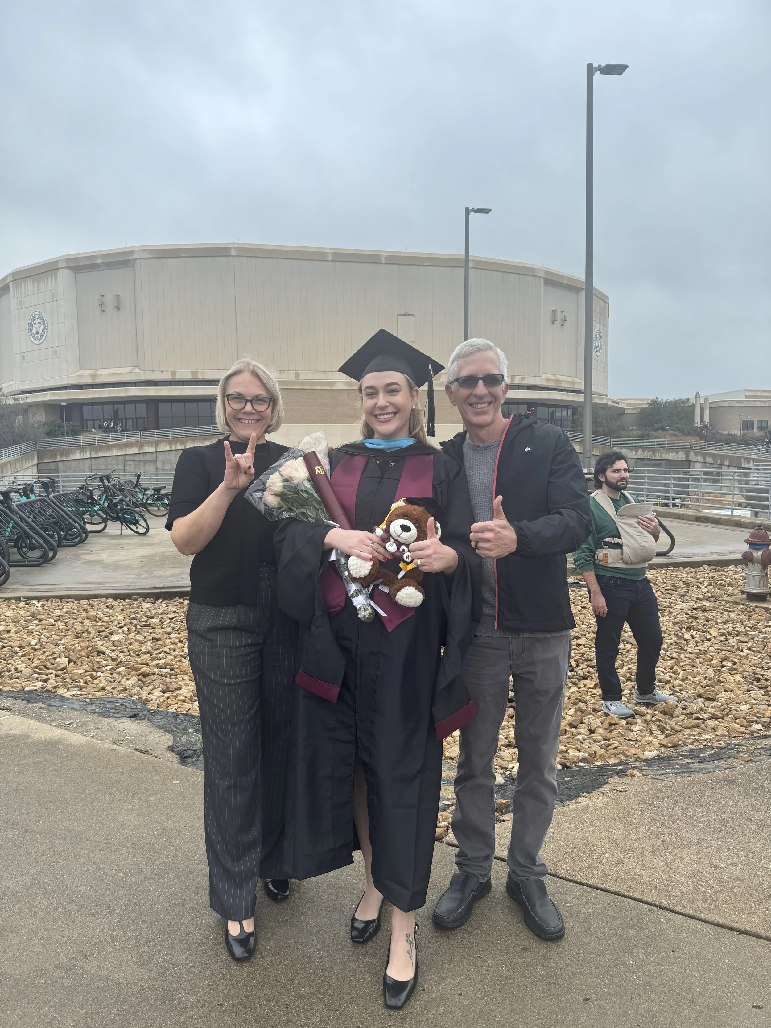 With my parents at graduation.