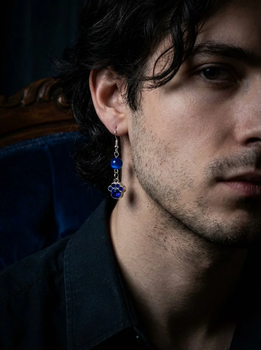 Silver Paw Earring with Dark Blue Gems