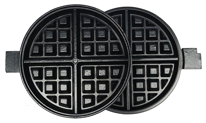 Round black waffle iron with square patterned surface, open showing two halves.