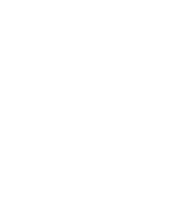 A desk lamp, a speaker with a grill, a turntable, and a spray bottle