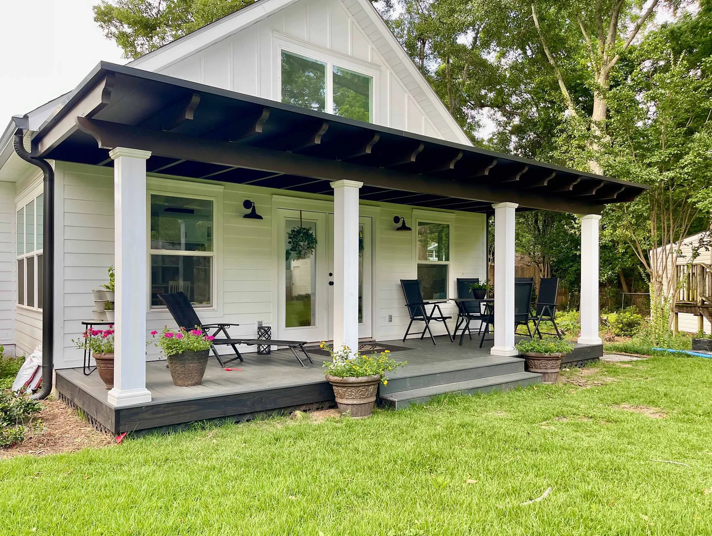 Awning installed to create a shaded entry or outdoor living area.