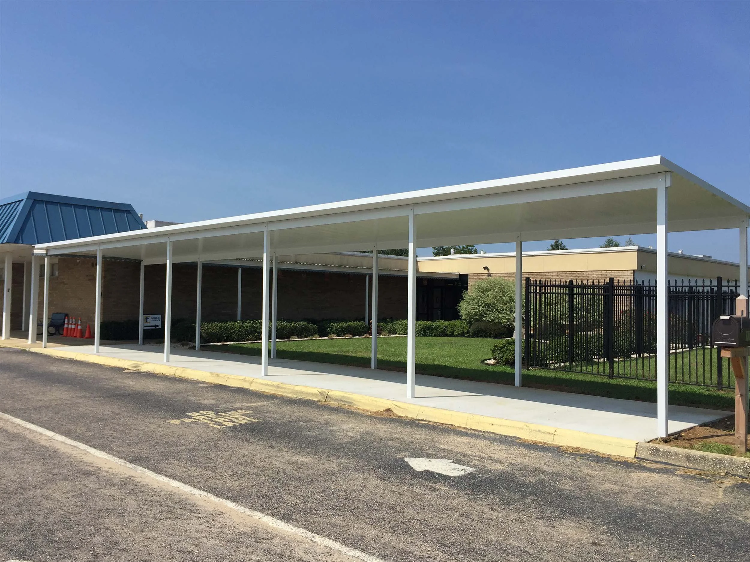 Covered walkway designed to protect pedestrians from sun and rain.