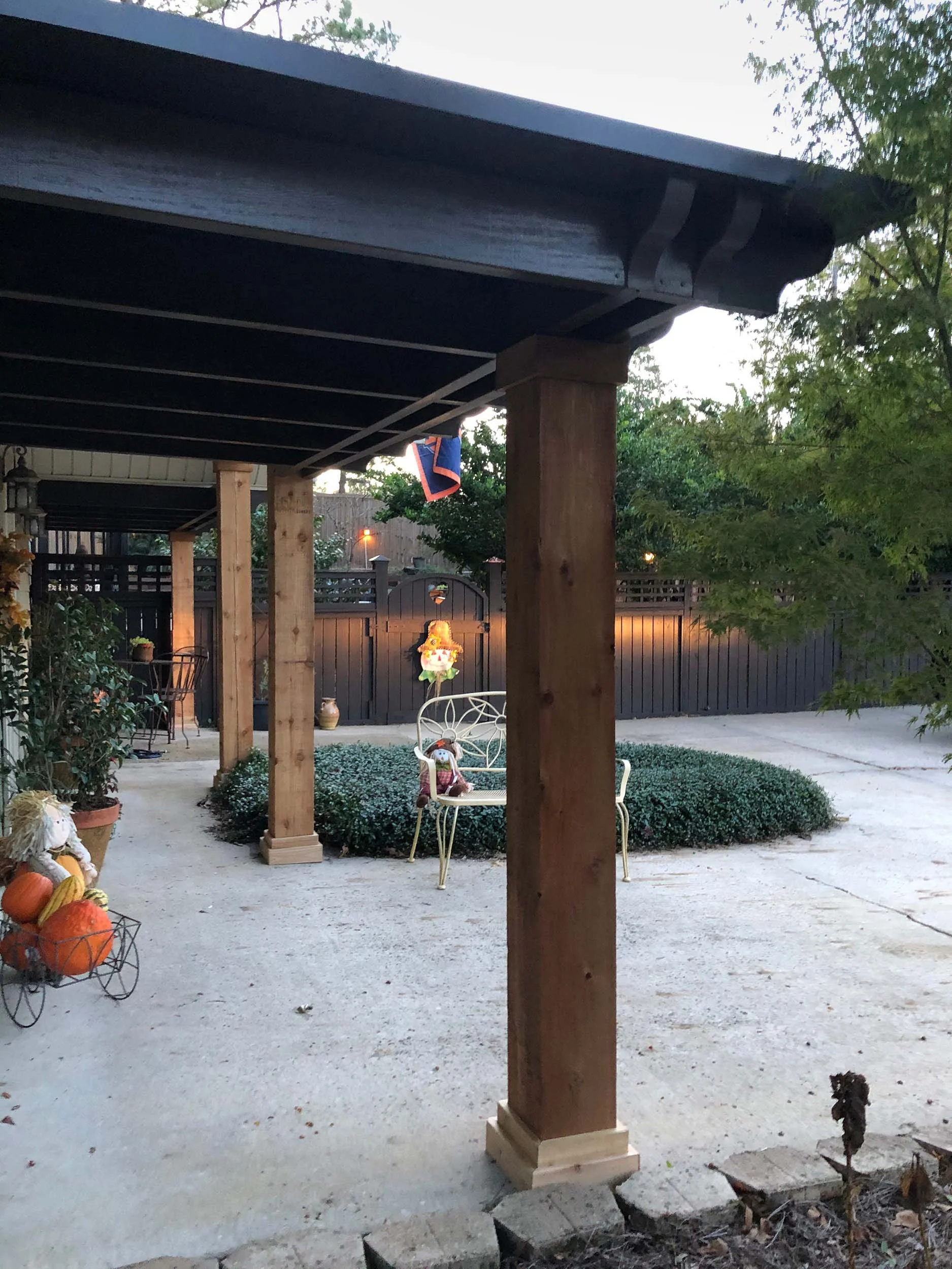 Patio cover installation creating a protected space for relaxing outdoors.
