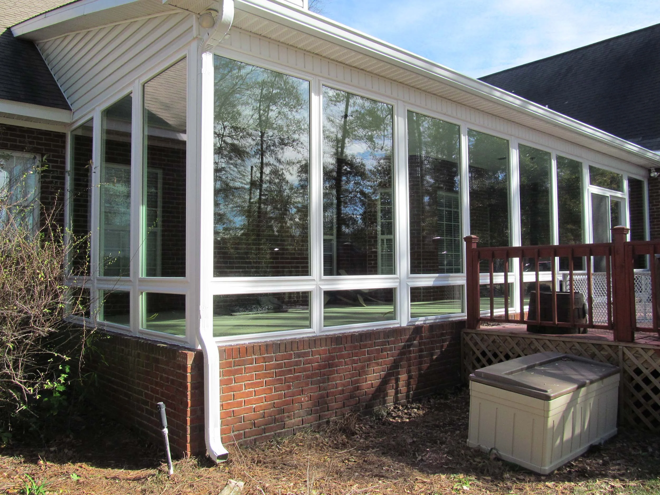 Sunroom addition creating a bright, protected space for year-round enjoyment.