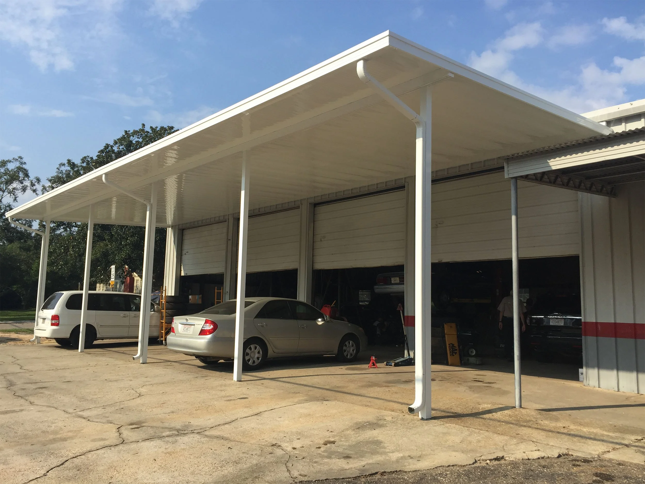 Business awning designed to provide shade, weather coverage, and exterior detail.