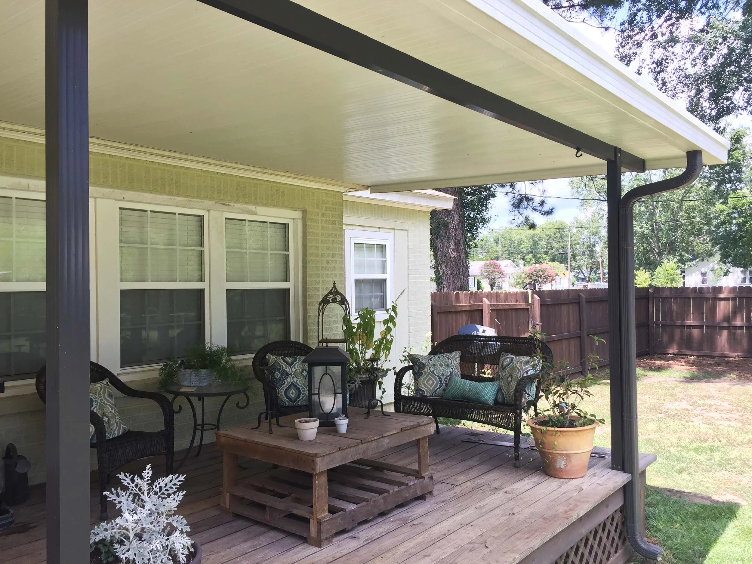 Patio cover designed to protect outdoor furniture and gathering spaces.