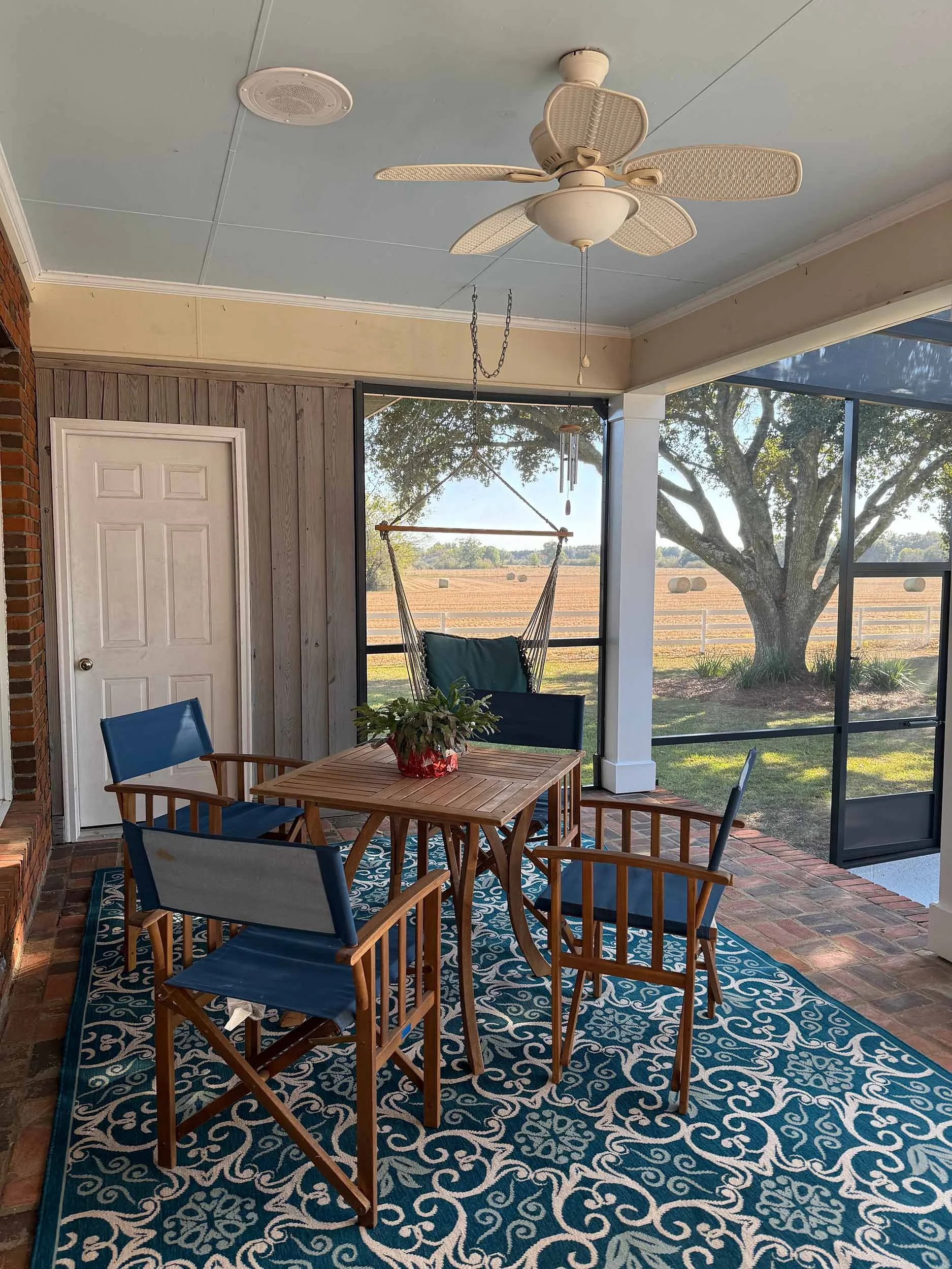 Durable screenroom installation designed to enhance a residential patio area.