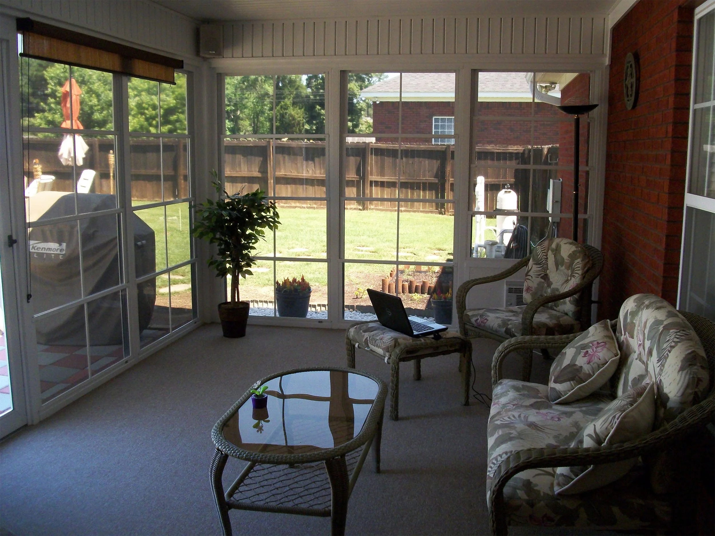 Custom porch enclosure with EZE-Breeze windows for flexible outdoor living.