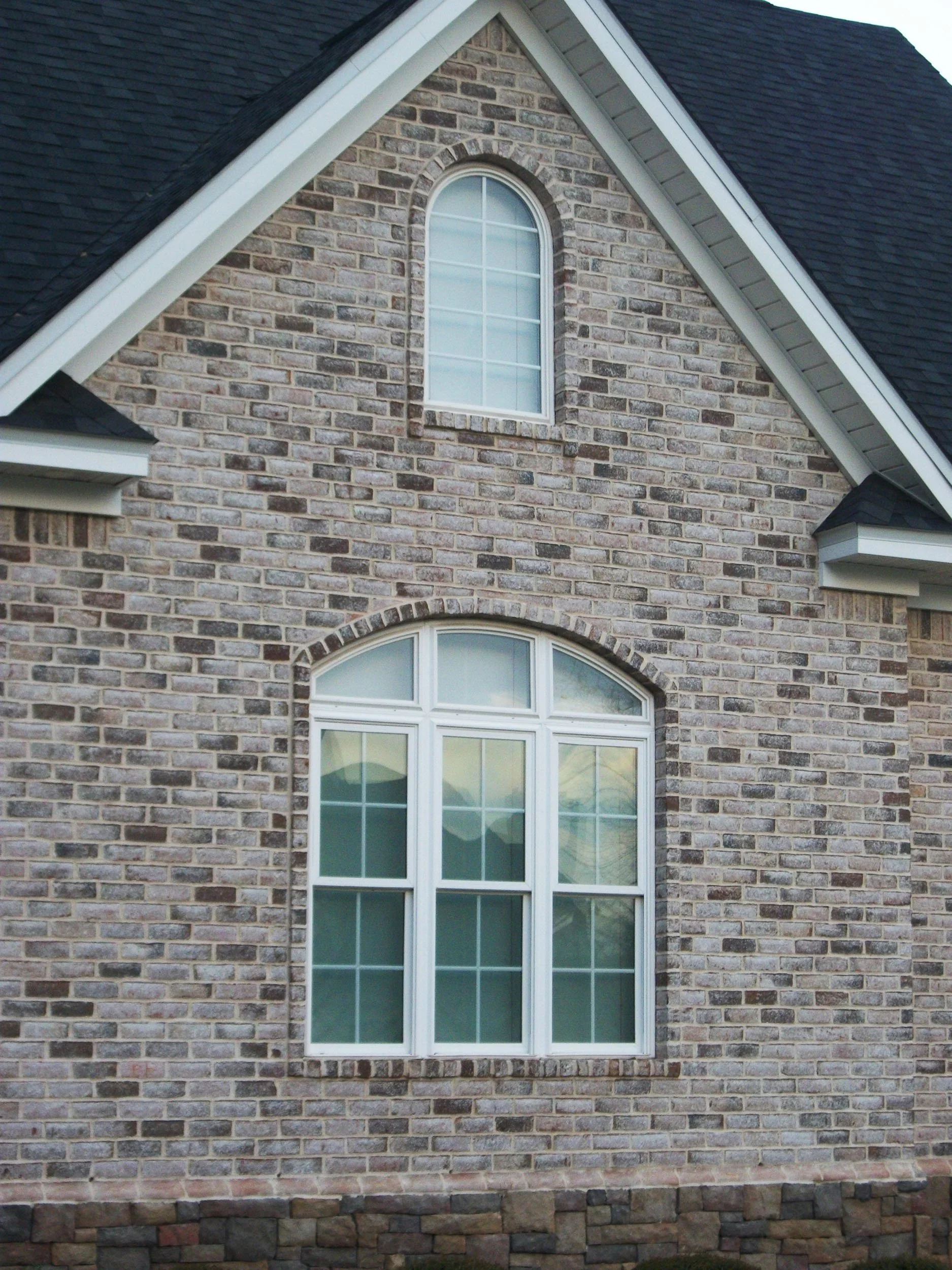 Energy-efficient replacement windows by Hathcock Home Services.