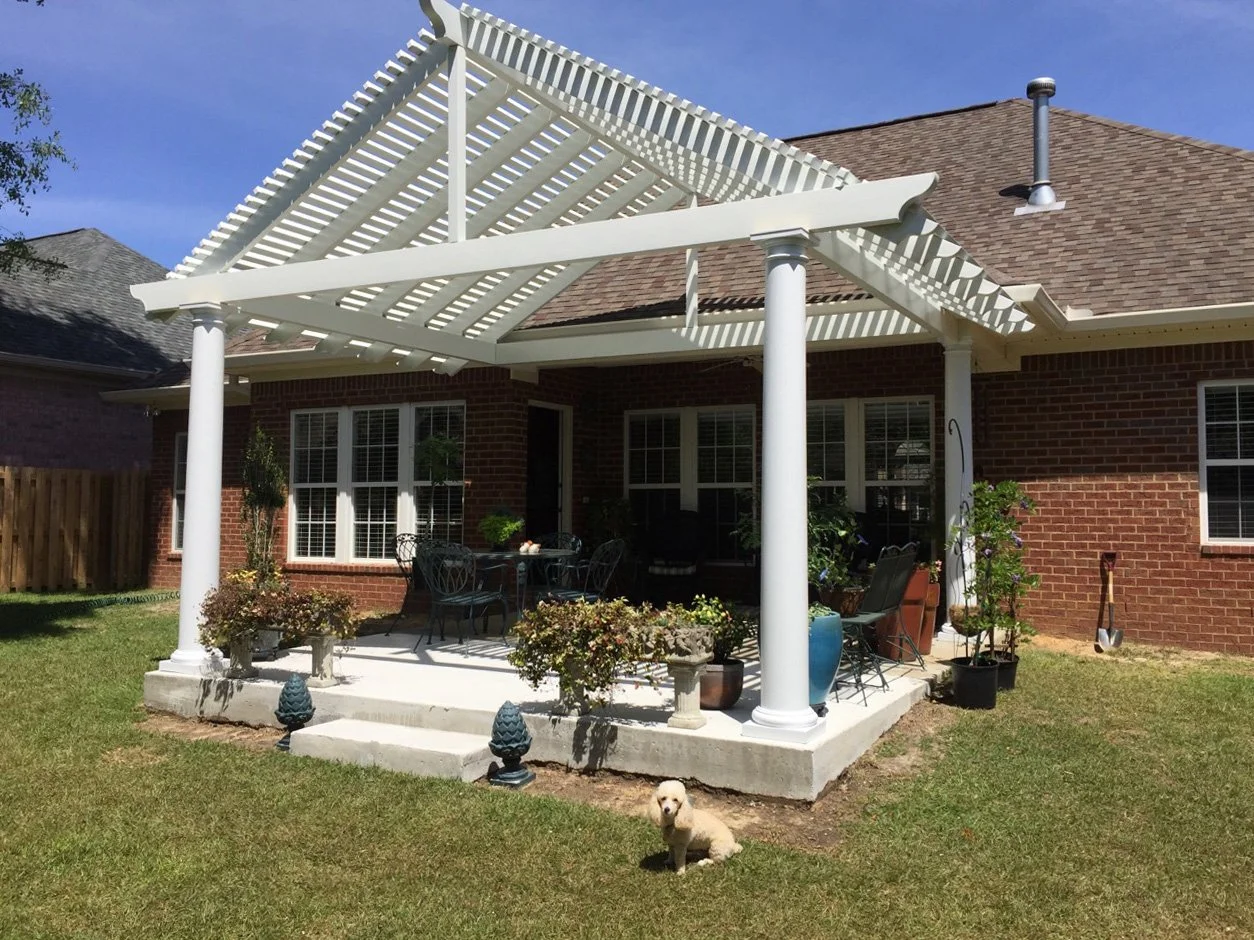 Custom backyard pergola installed for added shade and outdoor function.