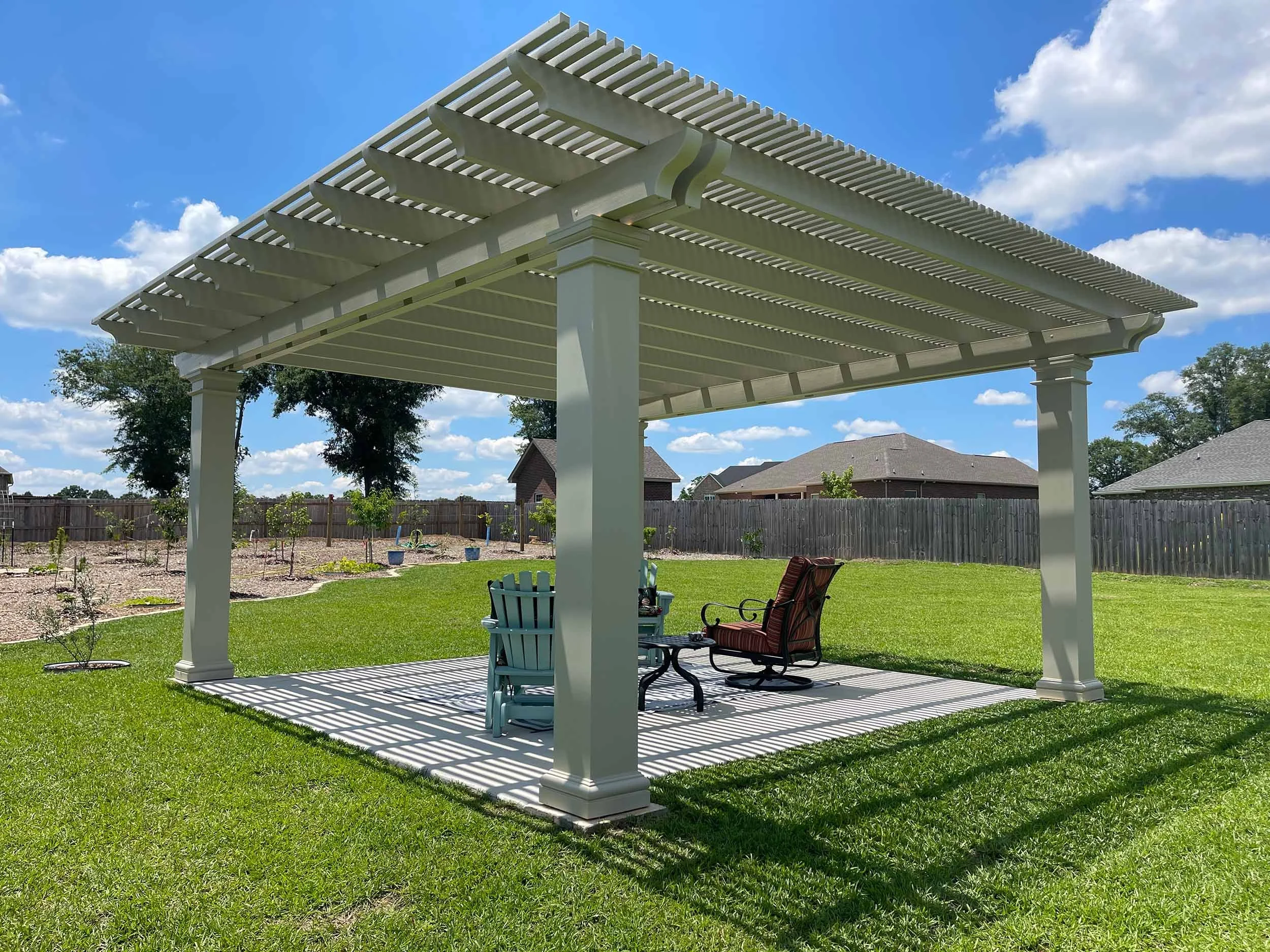Residential pergola by Hathcock Home Services for a comfortable backyard area.
