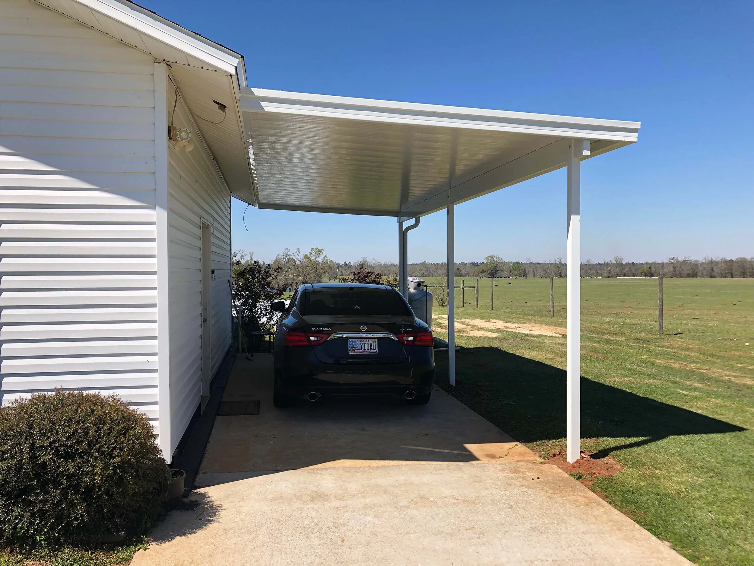 Custom carport installation for a residential home in the Dothan area.