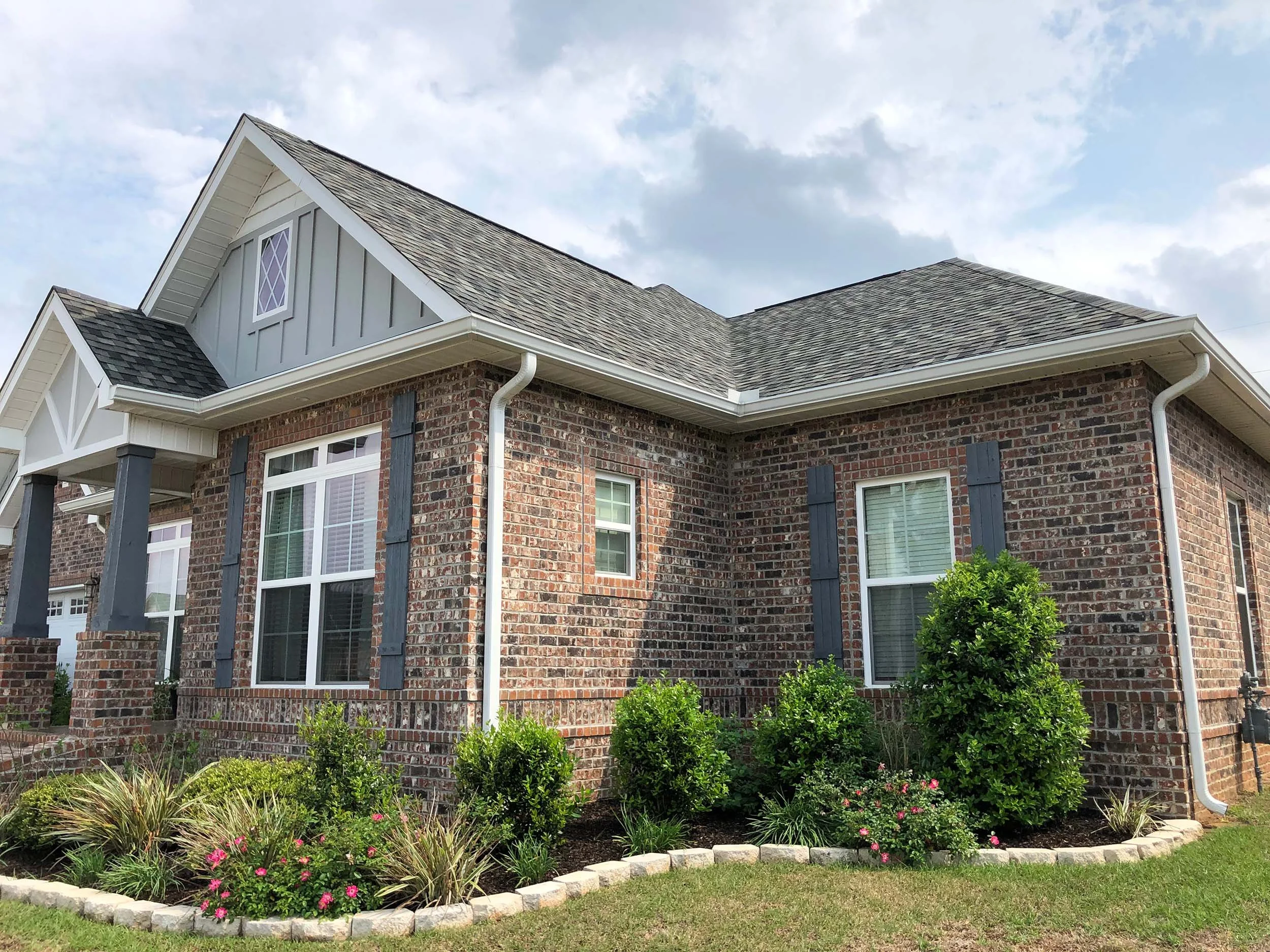 Seamless gutter installation on a residential home in the Dothan area.