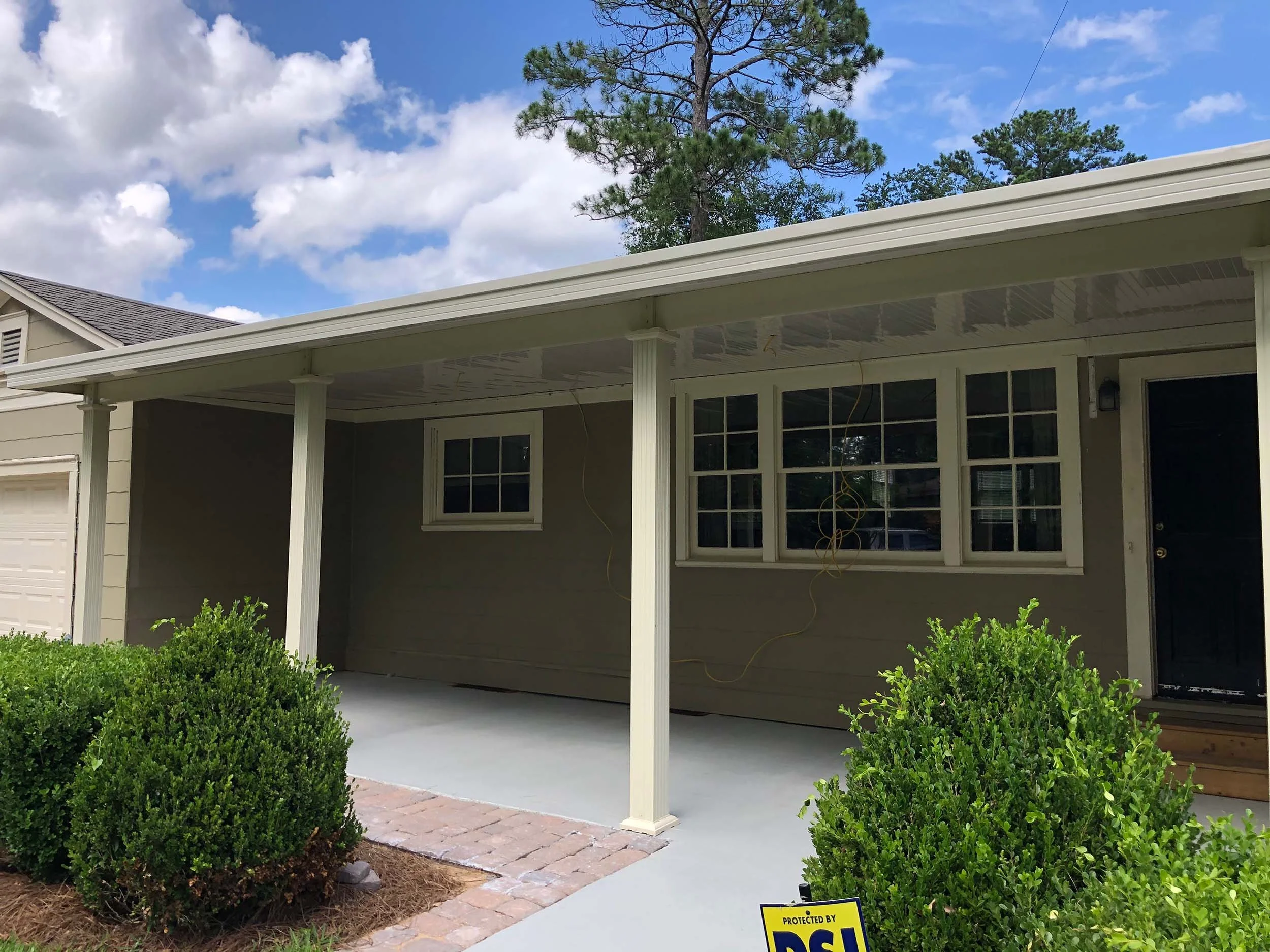 Awning installation designed to improve shade, comfort, and curb appeal.