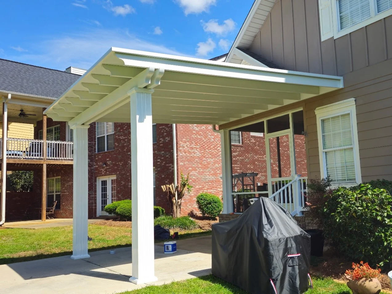 Awning and patio cover installation designed to enhance outdoor living.