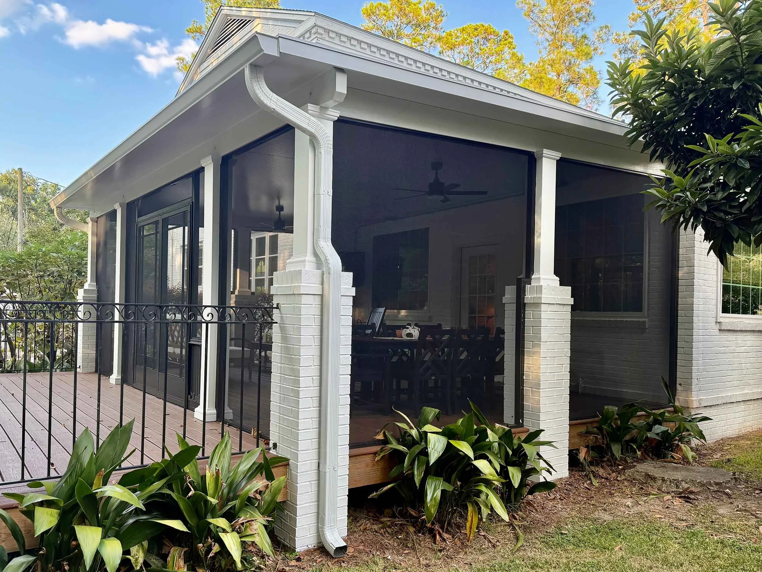 Residential screened porch installation with a bright, open design.