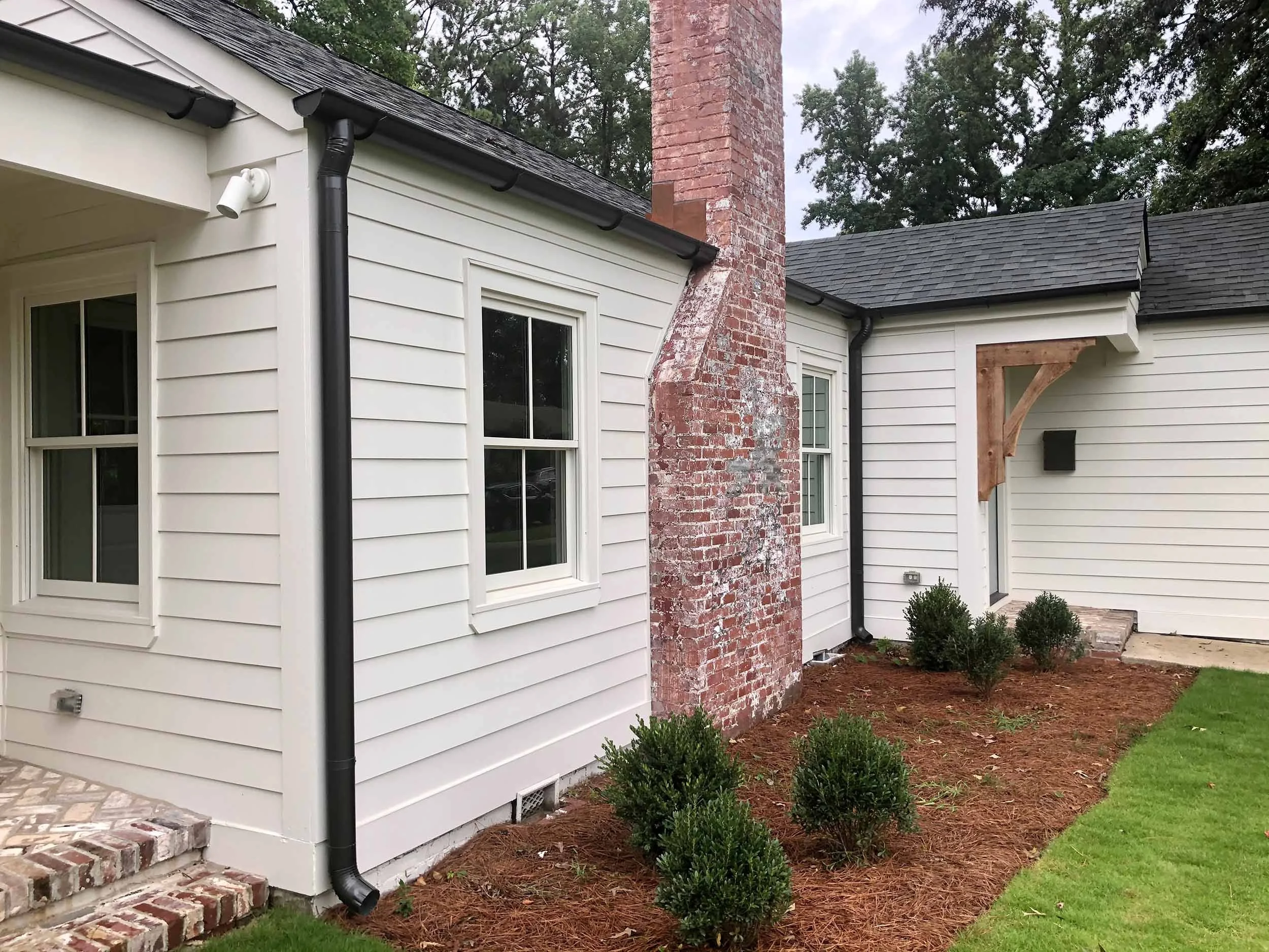 Seamless gutter system installed to help protect siding, landscaping, and foundation.