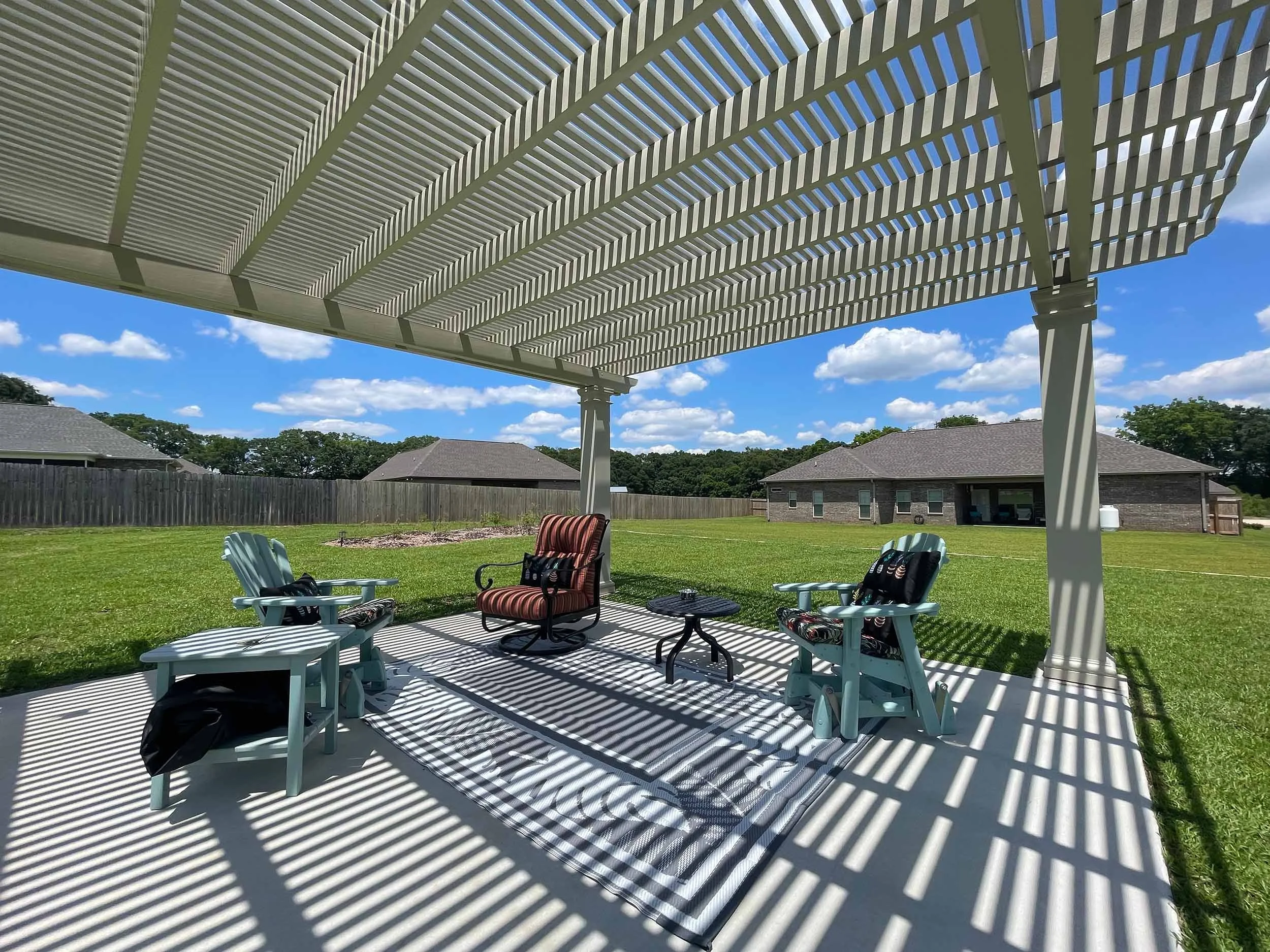 Backyard pergola addition designed to improve outdoor living and relaxation.