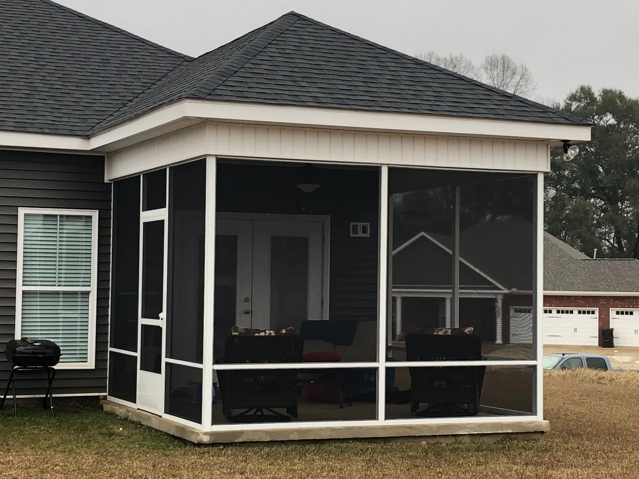 Custom screened outdoor space designed for fresh air and everyday relaxation.