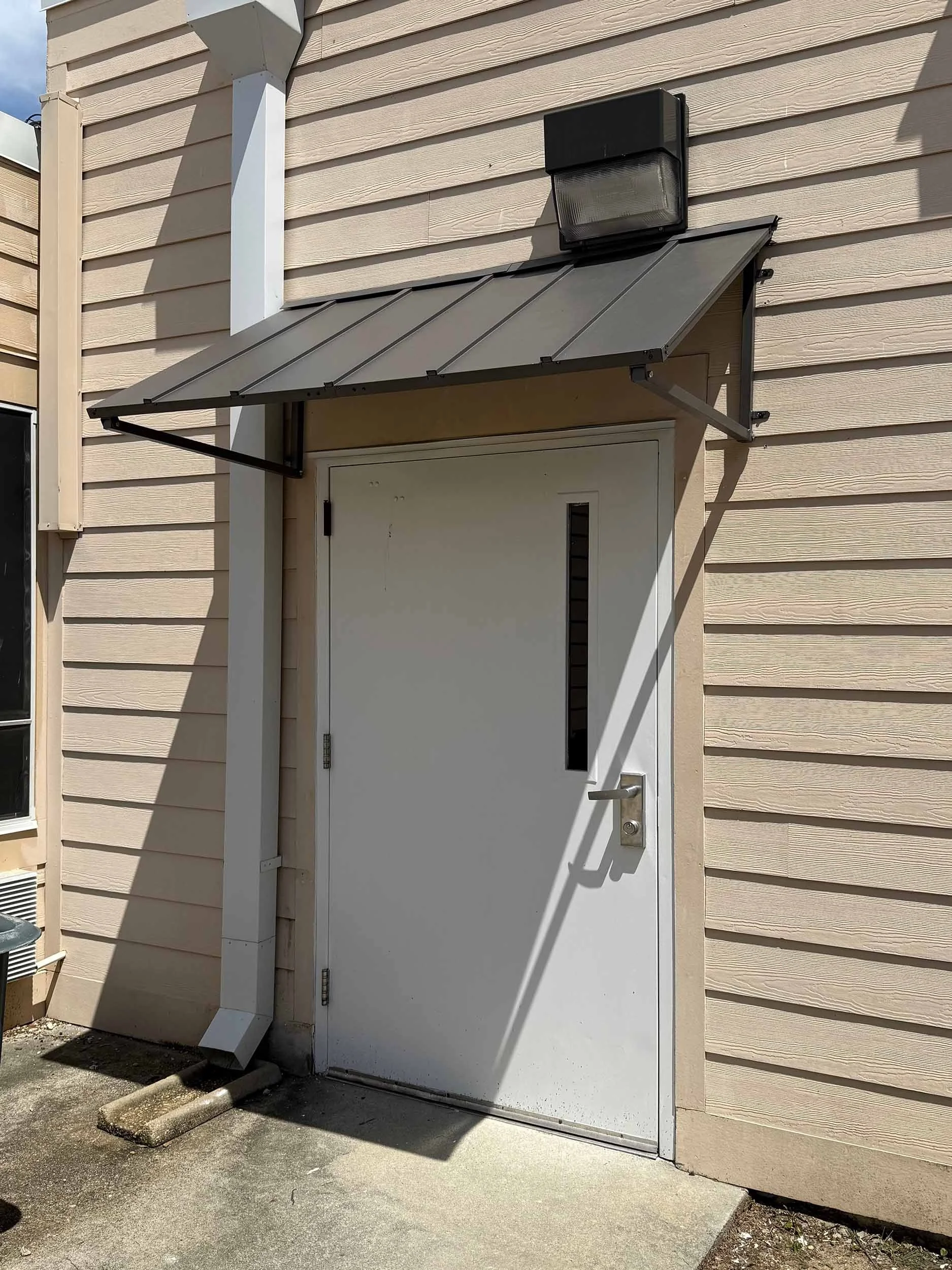 Custom commercial awning designed for long-lasting shade and exterior protection.